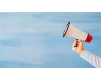 Hand holding a loud speaker