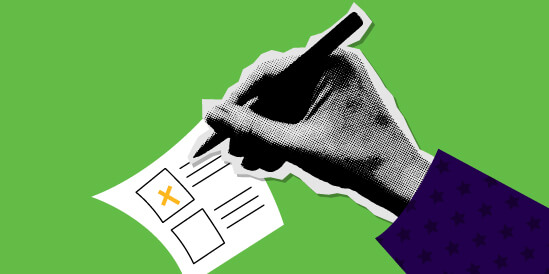 A hand putting a cross on a ballot paper