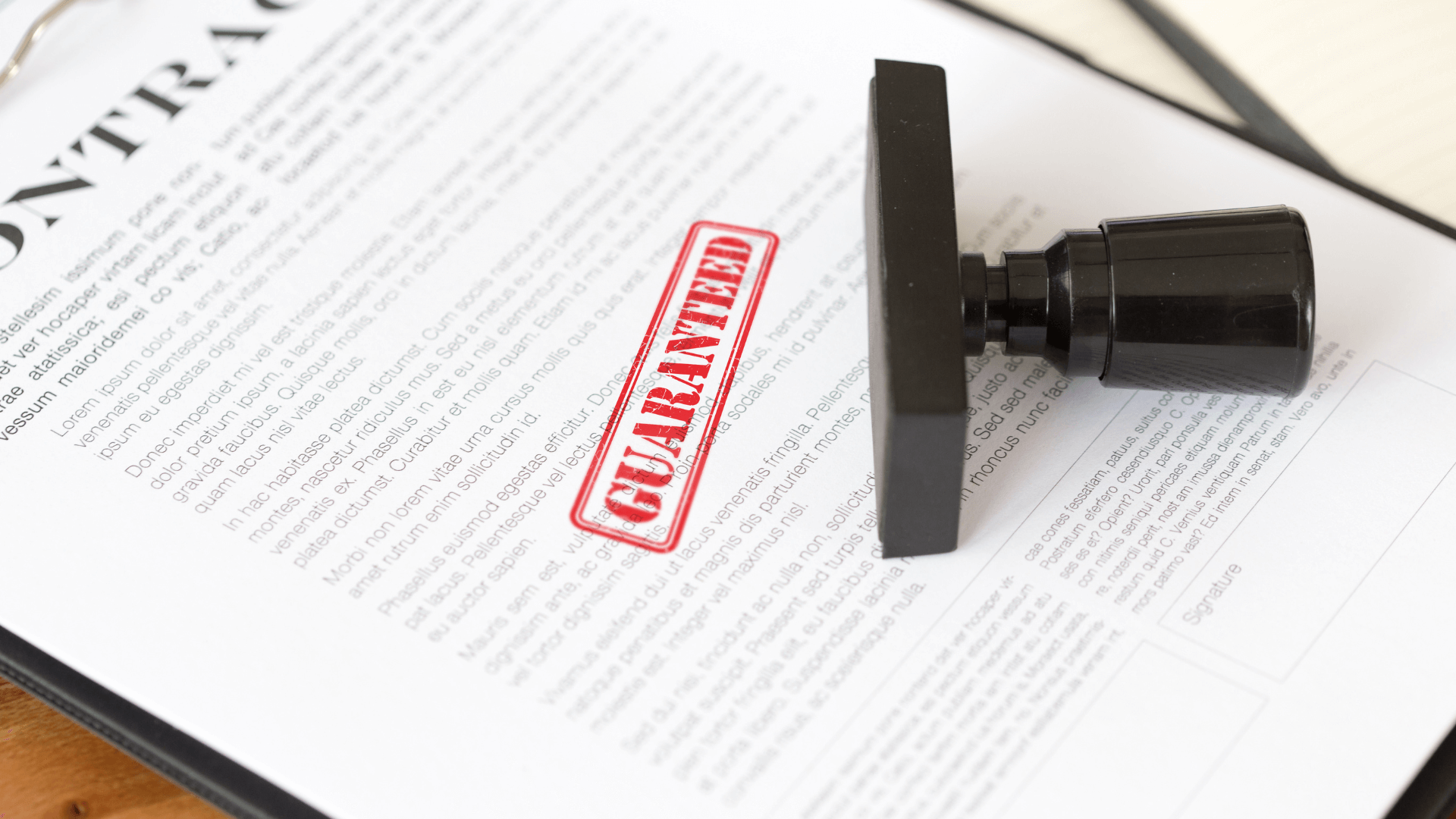 Contract stamped with guaranteed