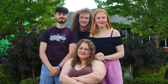 business people sitting round a table